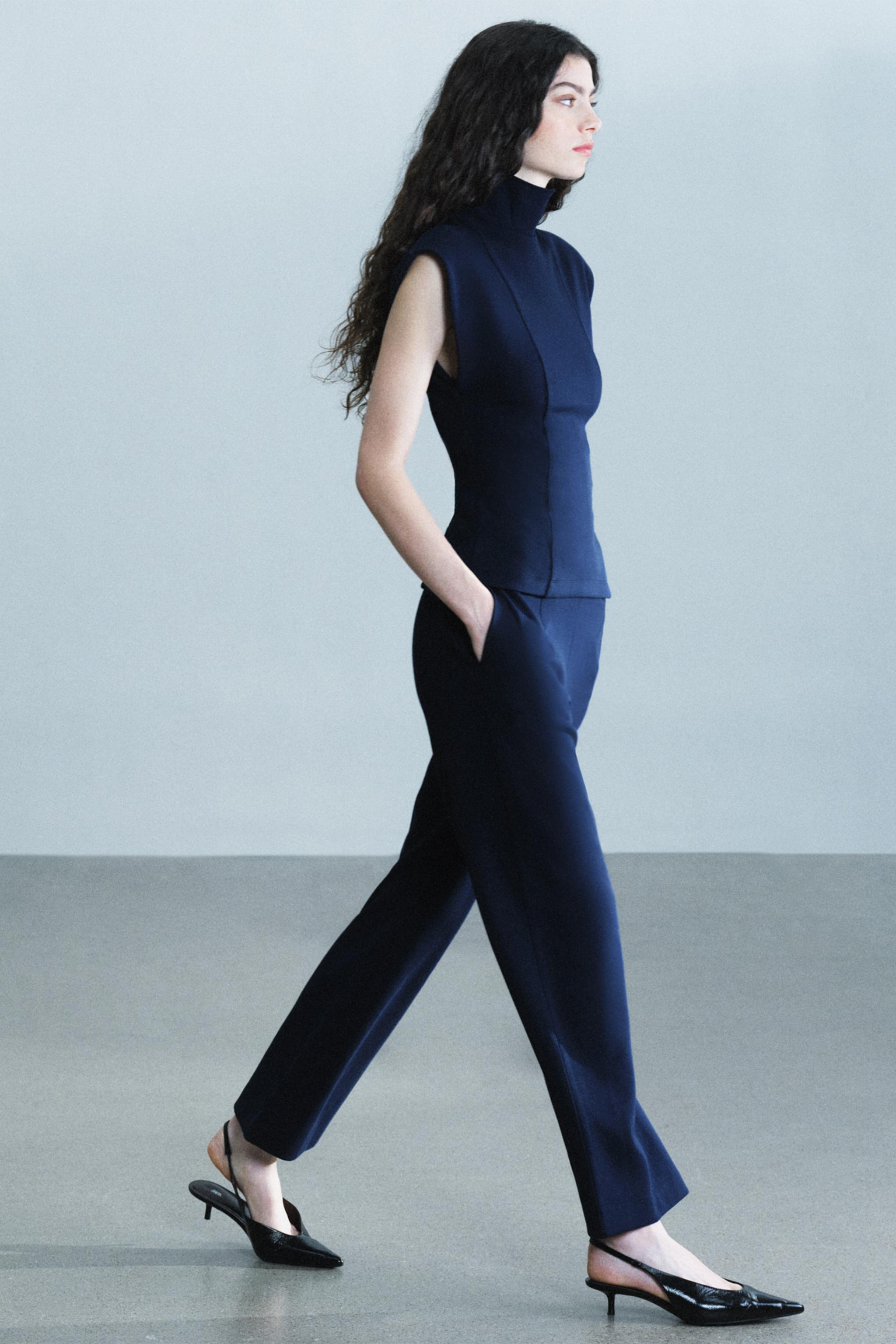 INTERLOCK PLEATED PANTS